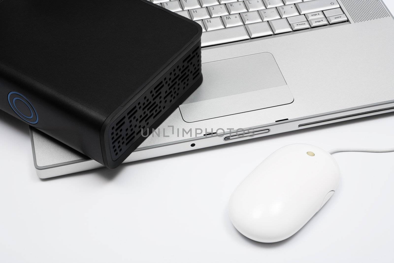 notebook, mouse and an external hard drive