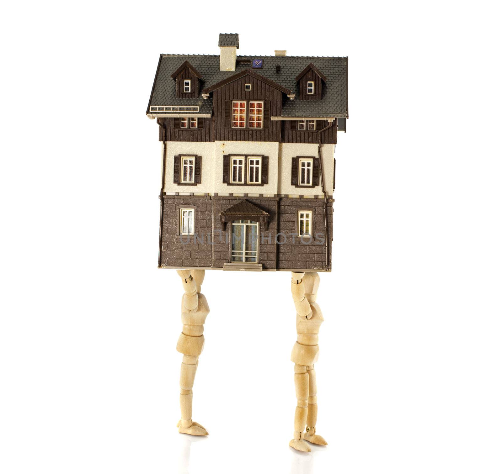 wooden puppets moving the house