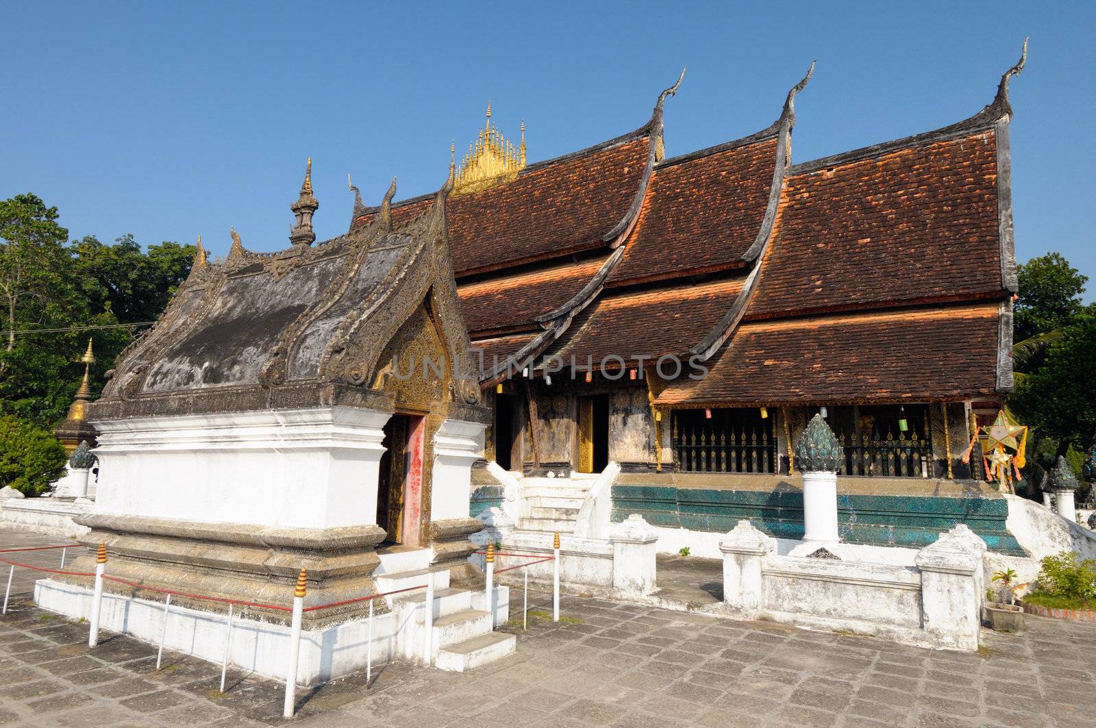 Architecture Wat Xieng Thong in Luang Prabang, Laos by ngungfoto