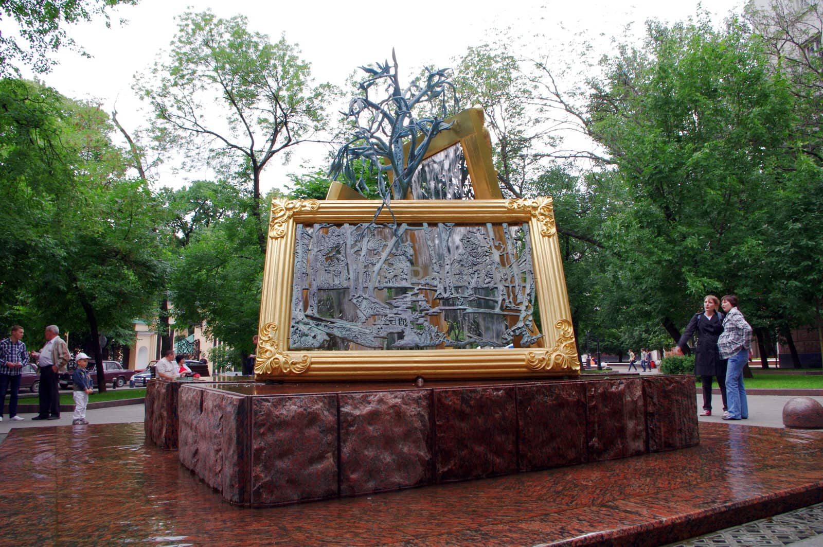 Moscow, Russia - June 14, 2010: Summer day. Peoples walk near the fountain of arts on June 14, 2010 in Lavrushinsky sidesteet, Moscow, Russia