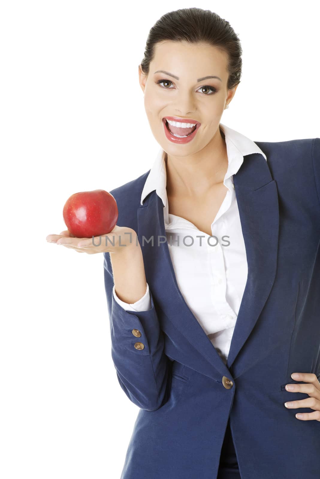 Attractive businesswoman holding red apple by BDS