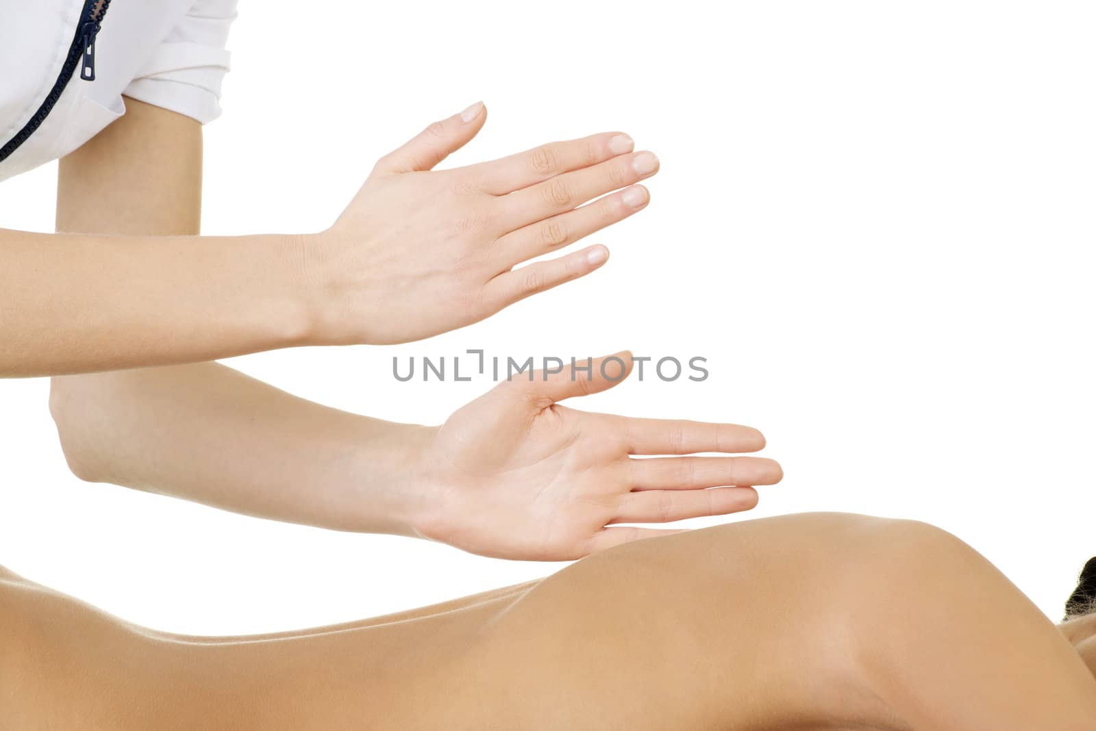 Preaty young woman relaxing beeing massaged by BDS