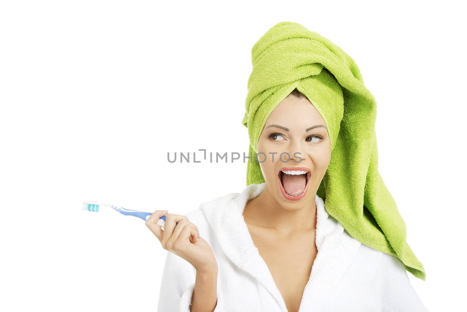 Happy attractive womanwith tooth brush by BDS