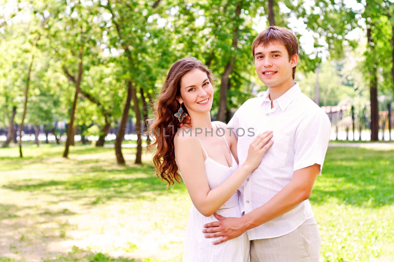 couple hugging in the park, have a good time together