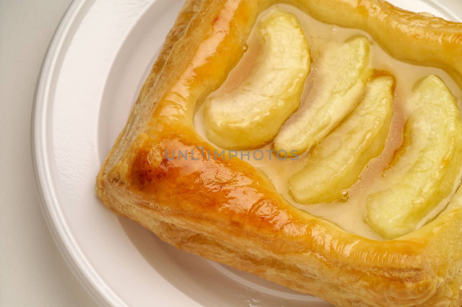 Apple puff pastry dessert closeup by Laborer