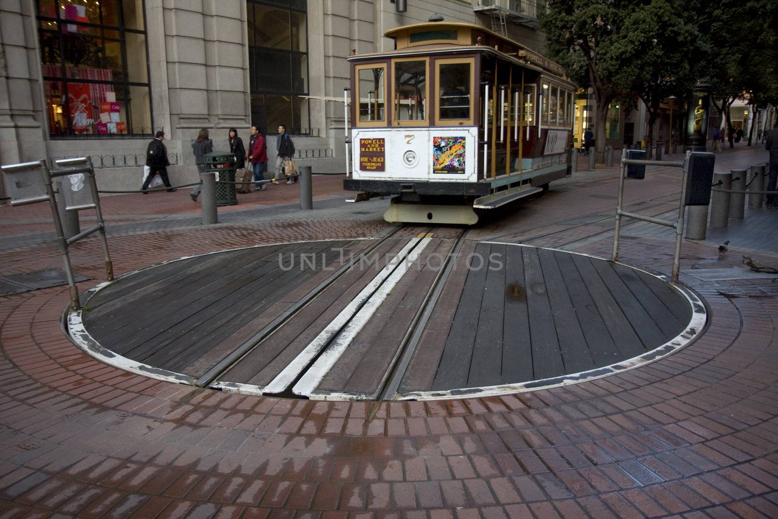 San Francisco cable car entering Powell Street terminal turntable, early morning