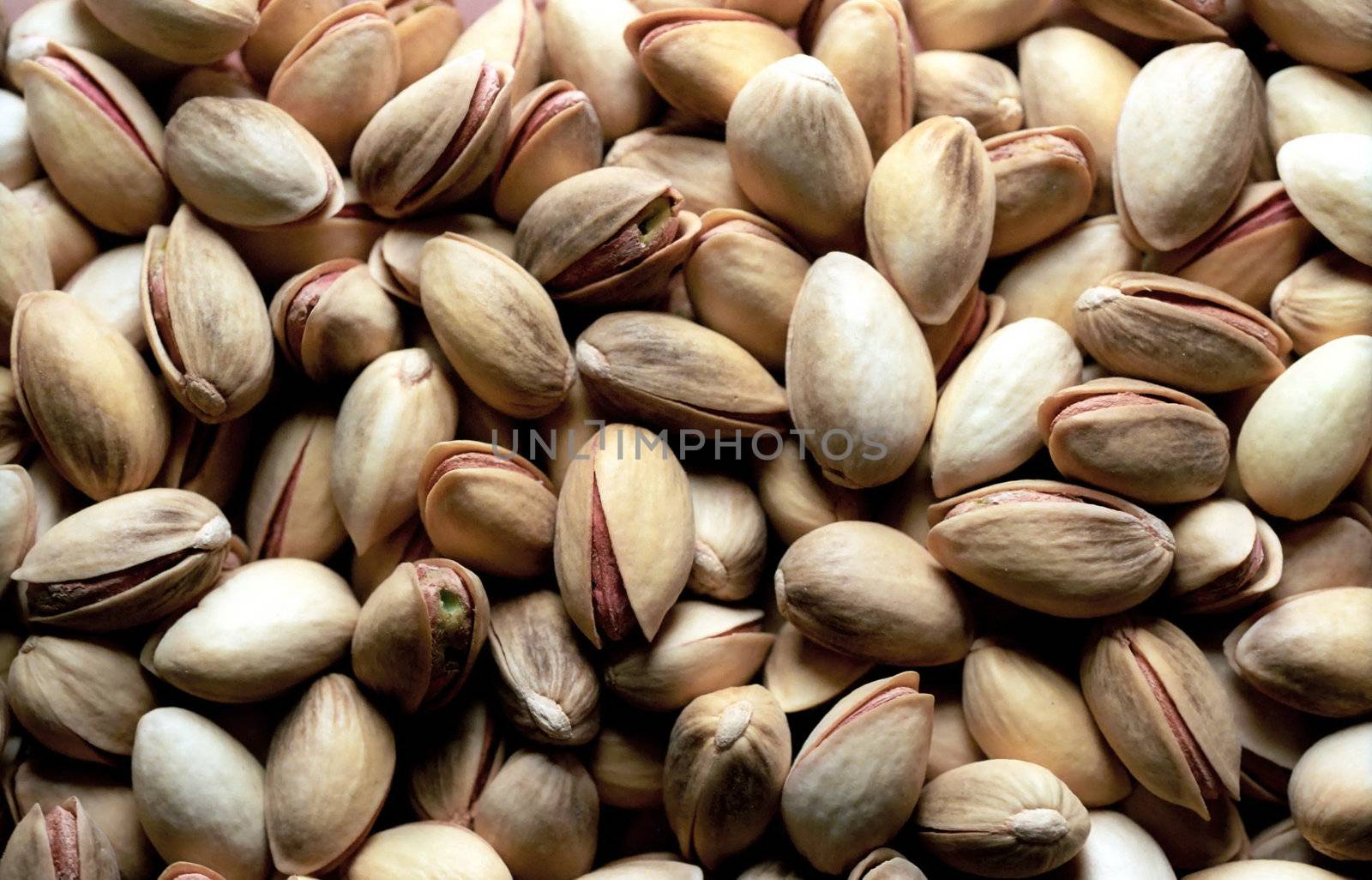 Open salted pistachio background