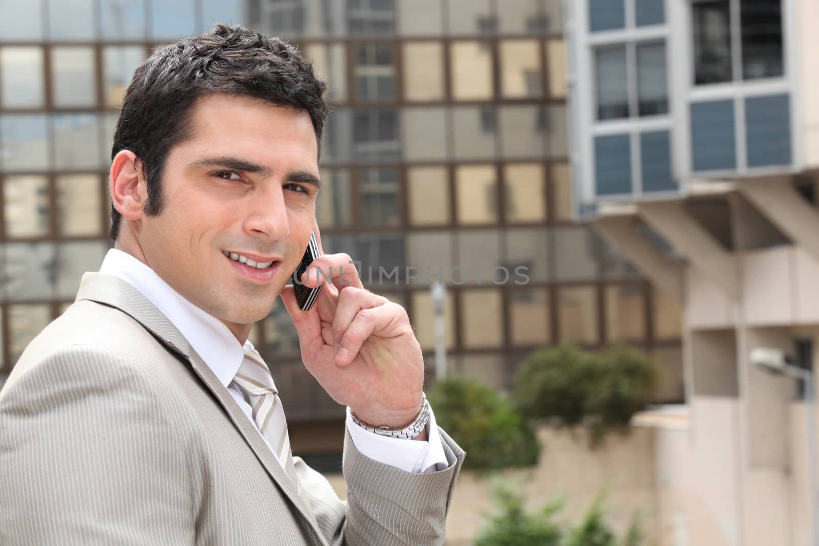 Young man having conversation on phone