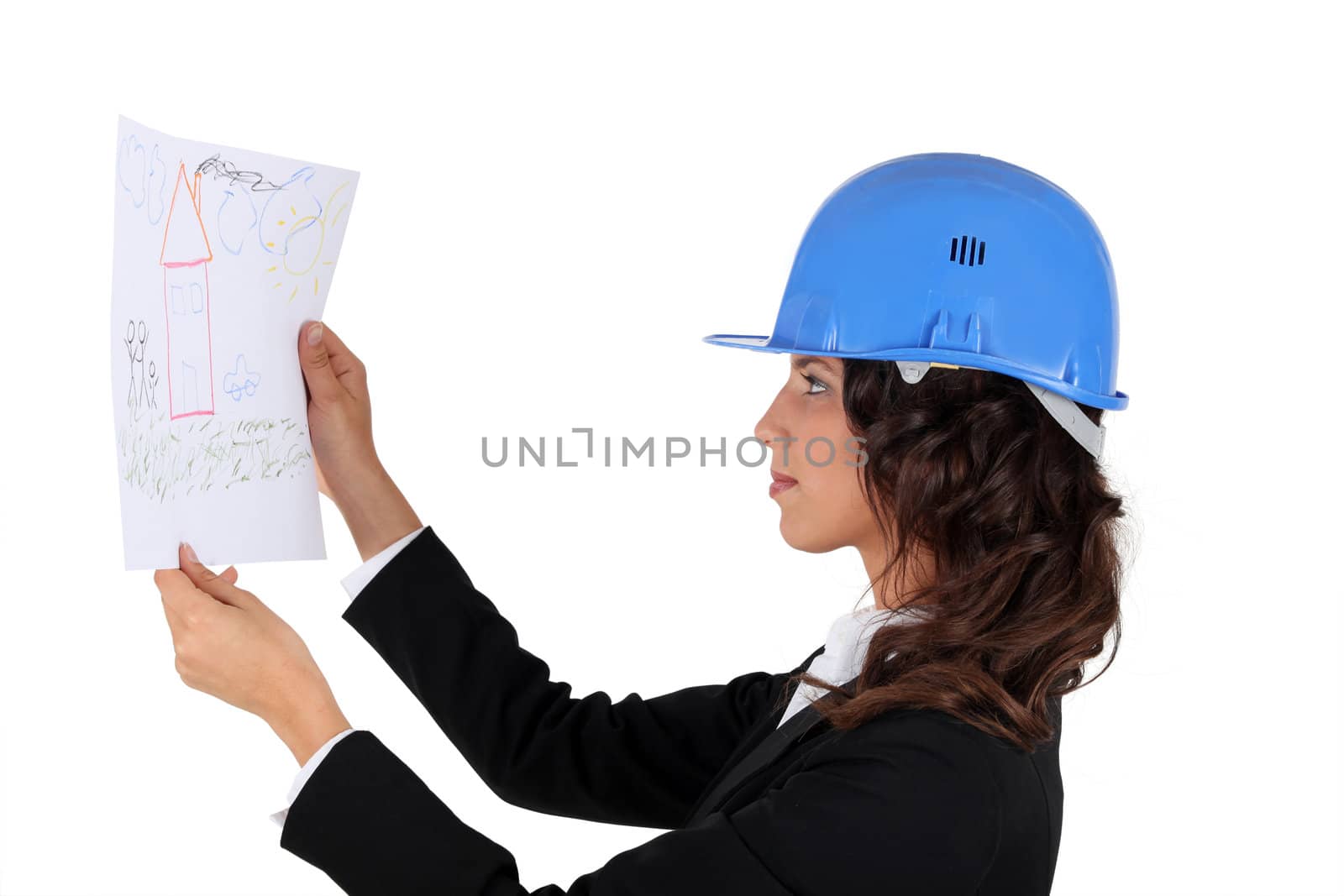 An engineer inspecting drawing