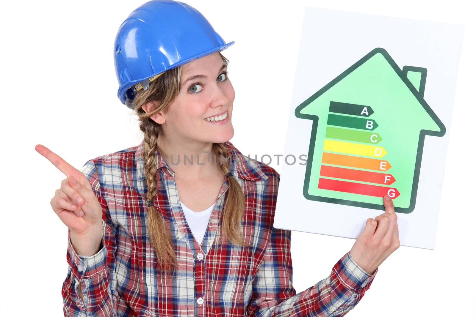 craftswoman holding an energy consumption label by phovoir
