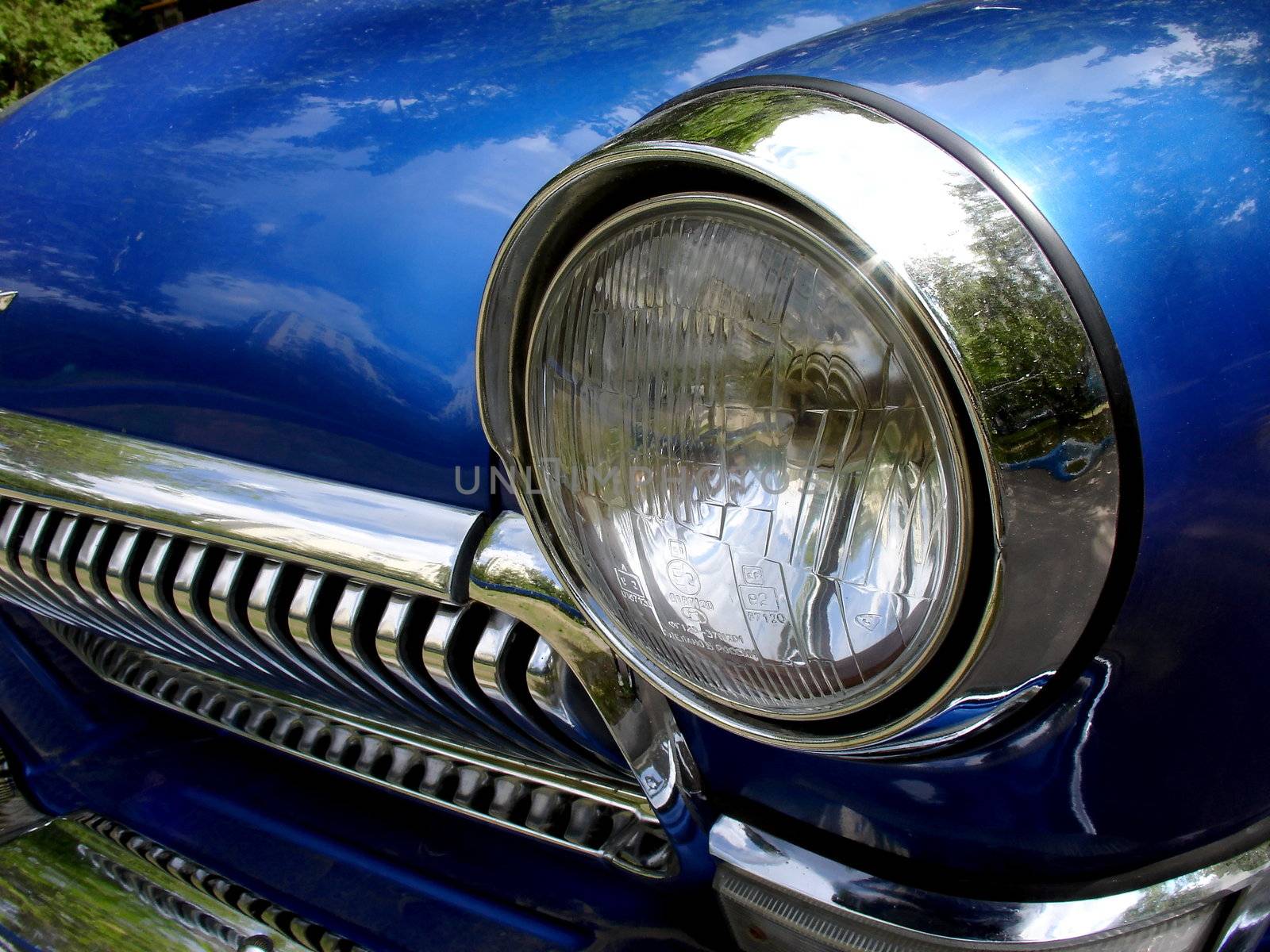 Headlight of the Russian blue retro car
