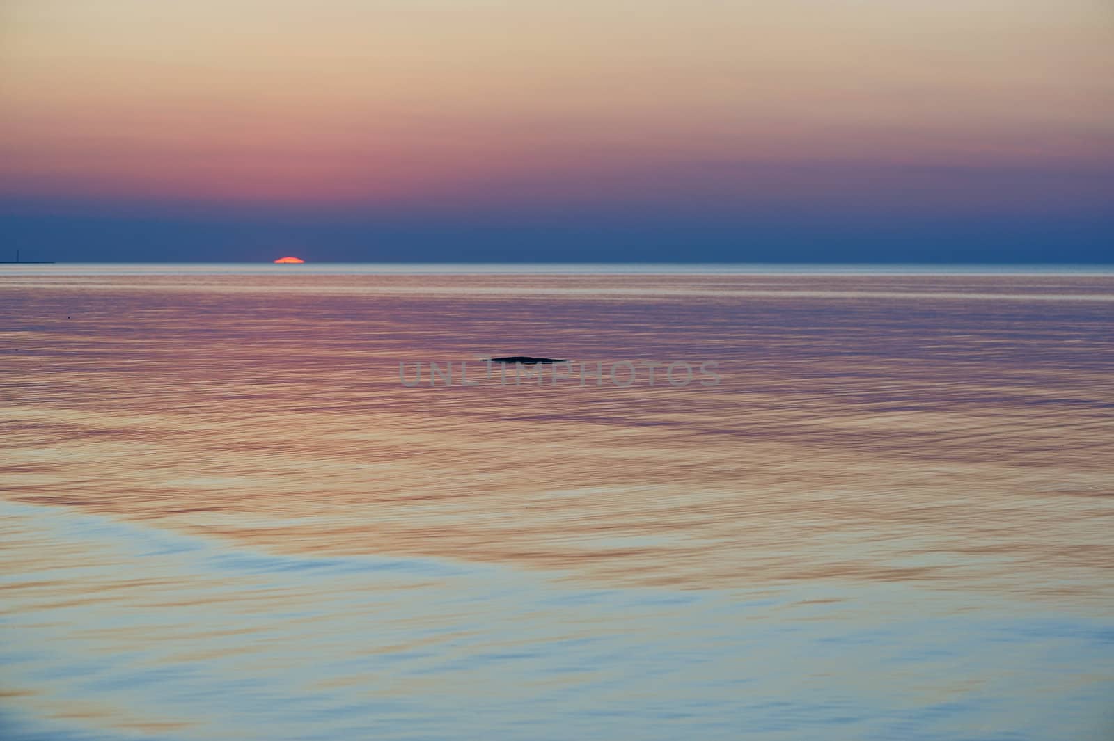 Beautiful sunset over the sea. Panoramic view