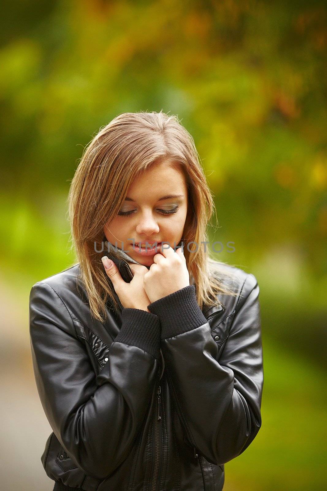 Beautiful girl on a background autumn nature