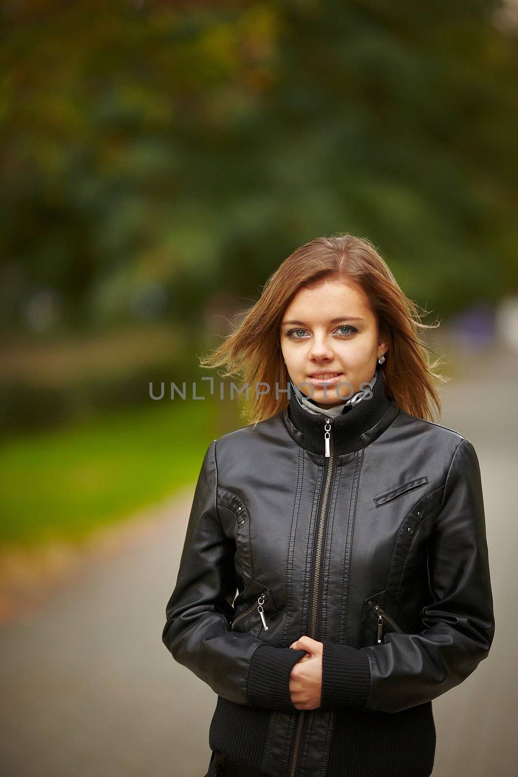 Beautiful girl on a background autumn nature