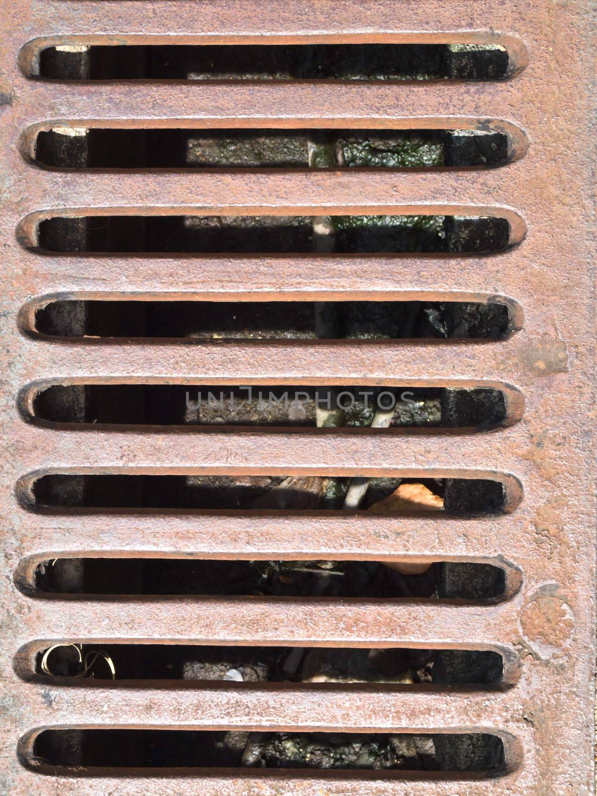 Rusty metal grate drain as background