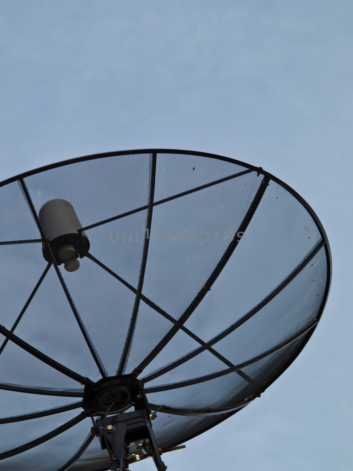 Part of satellite dish on a blue sky background