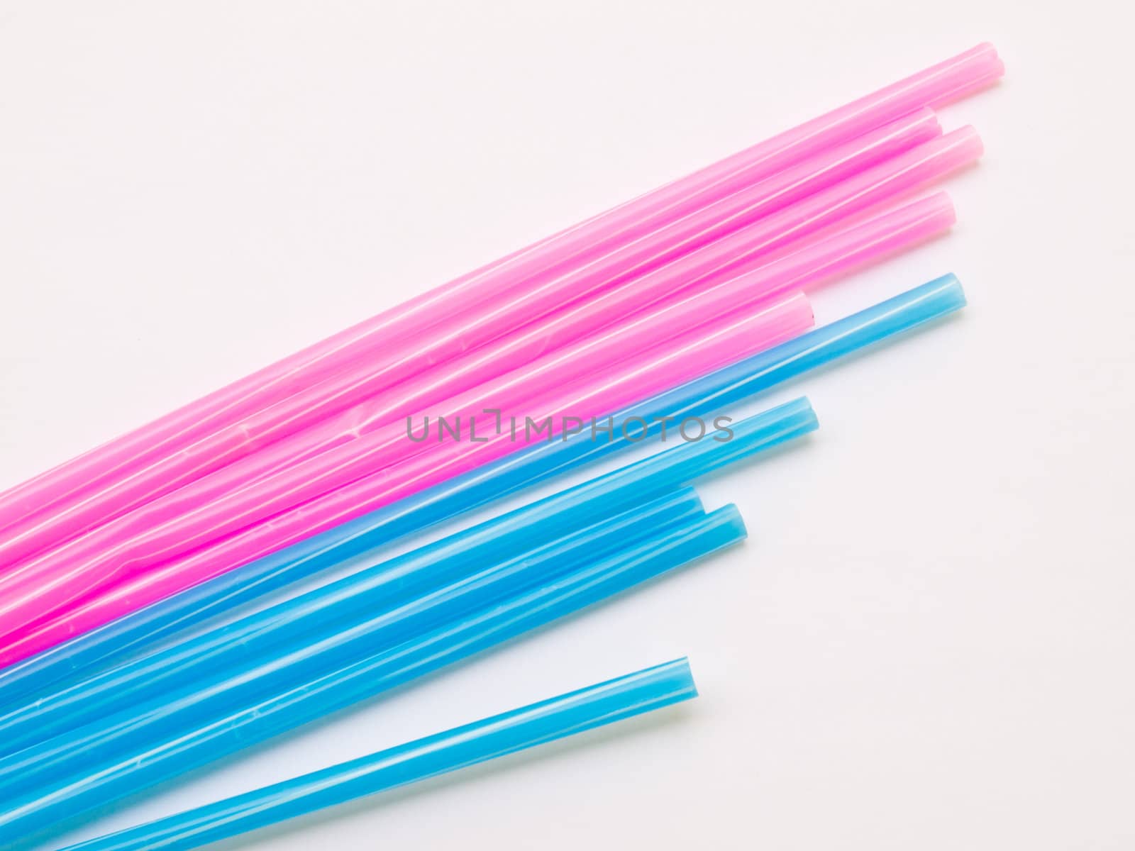 Light blue straws isolated on white back ground