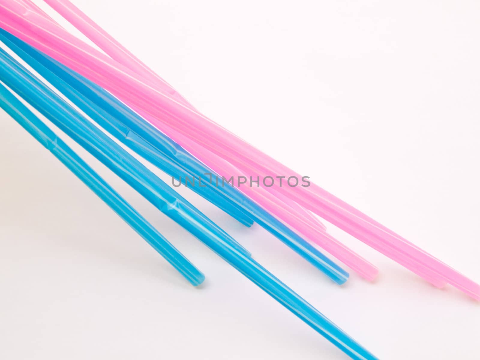 Light blue straws isolated on white back ground