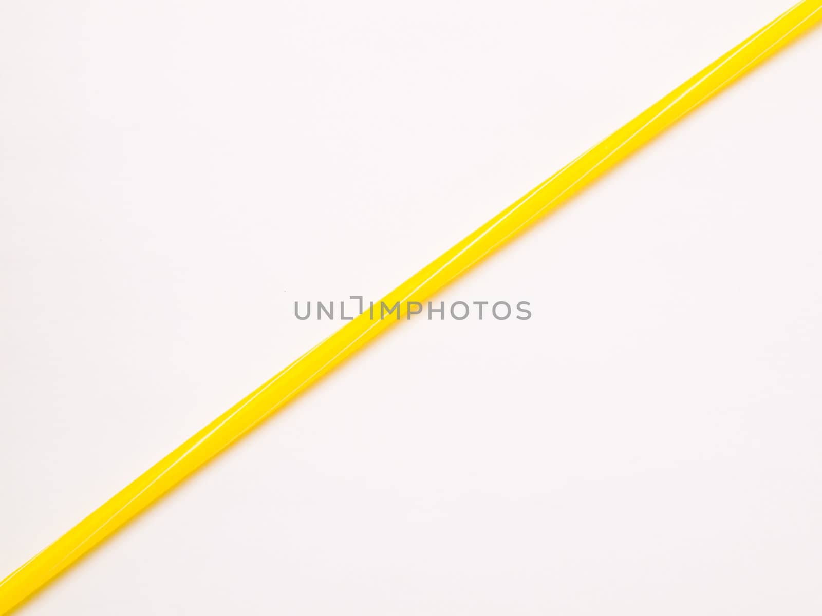 Yellow straw isolated on white back ground