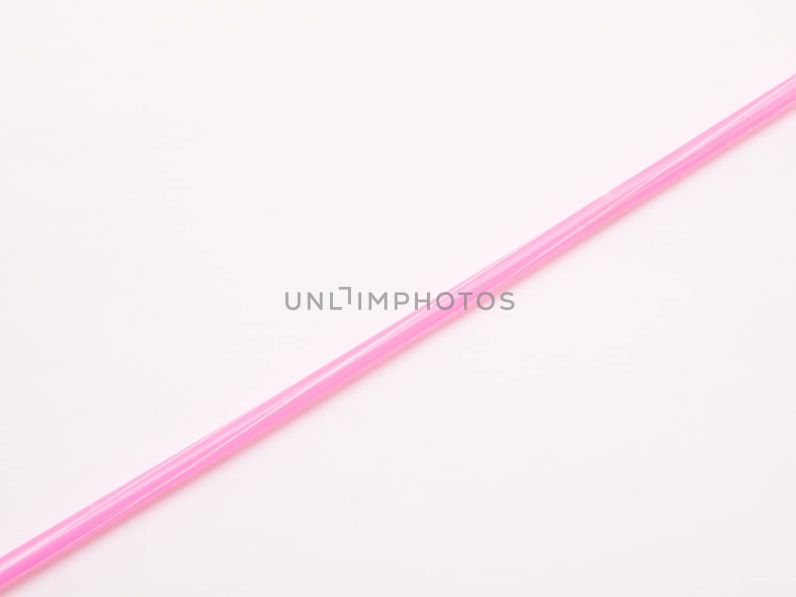 Pink straw isolated on white background