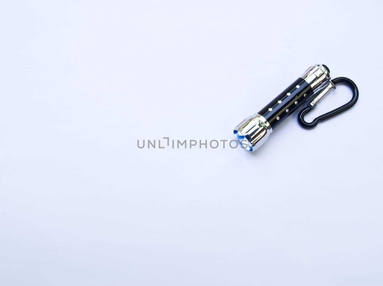 Pocket Flashlight isolated on white background