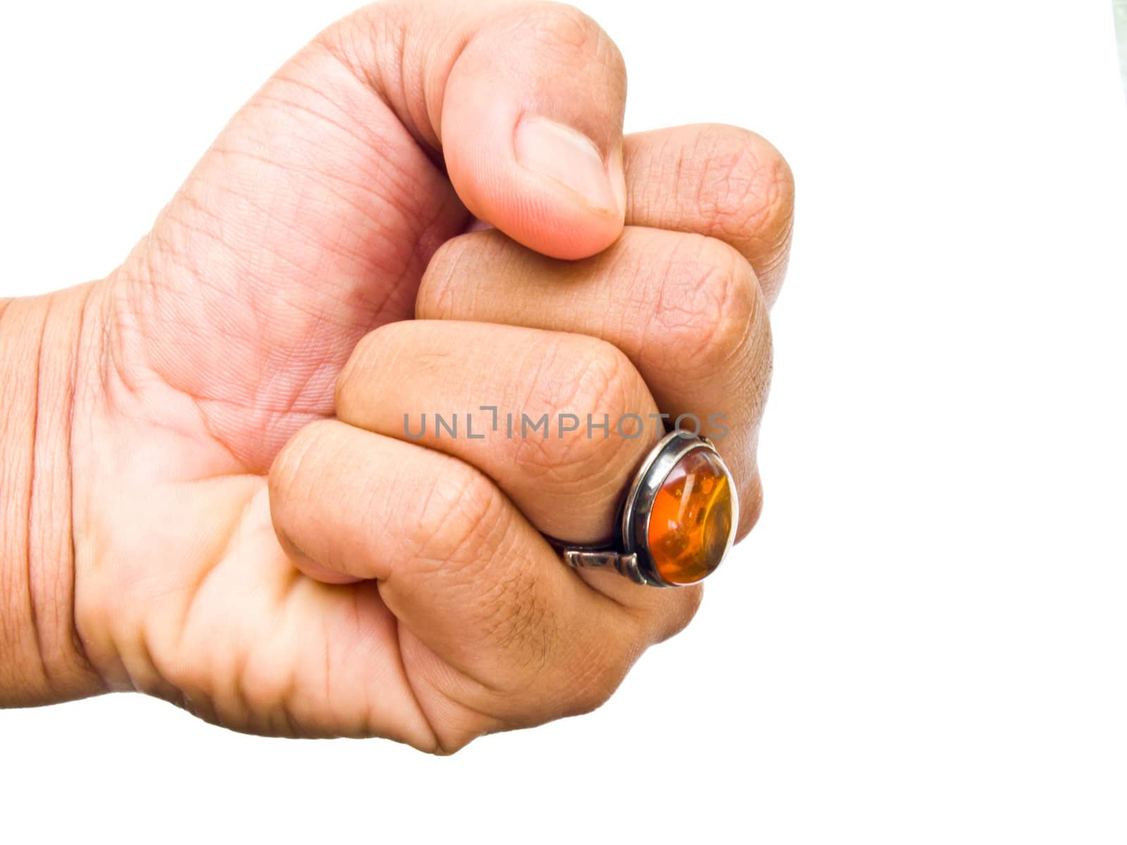 A guy hand with amber ring on his finger isolated on white background