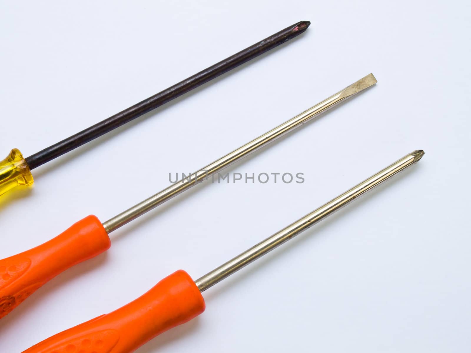 Used screwdrivers isolated on a white background