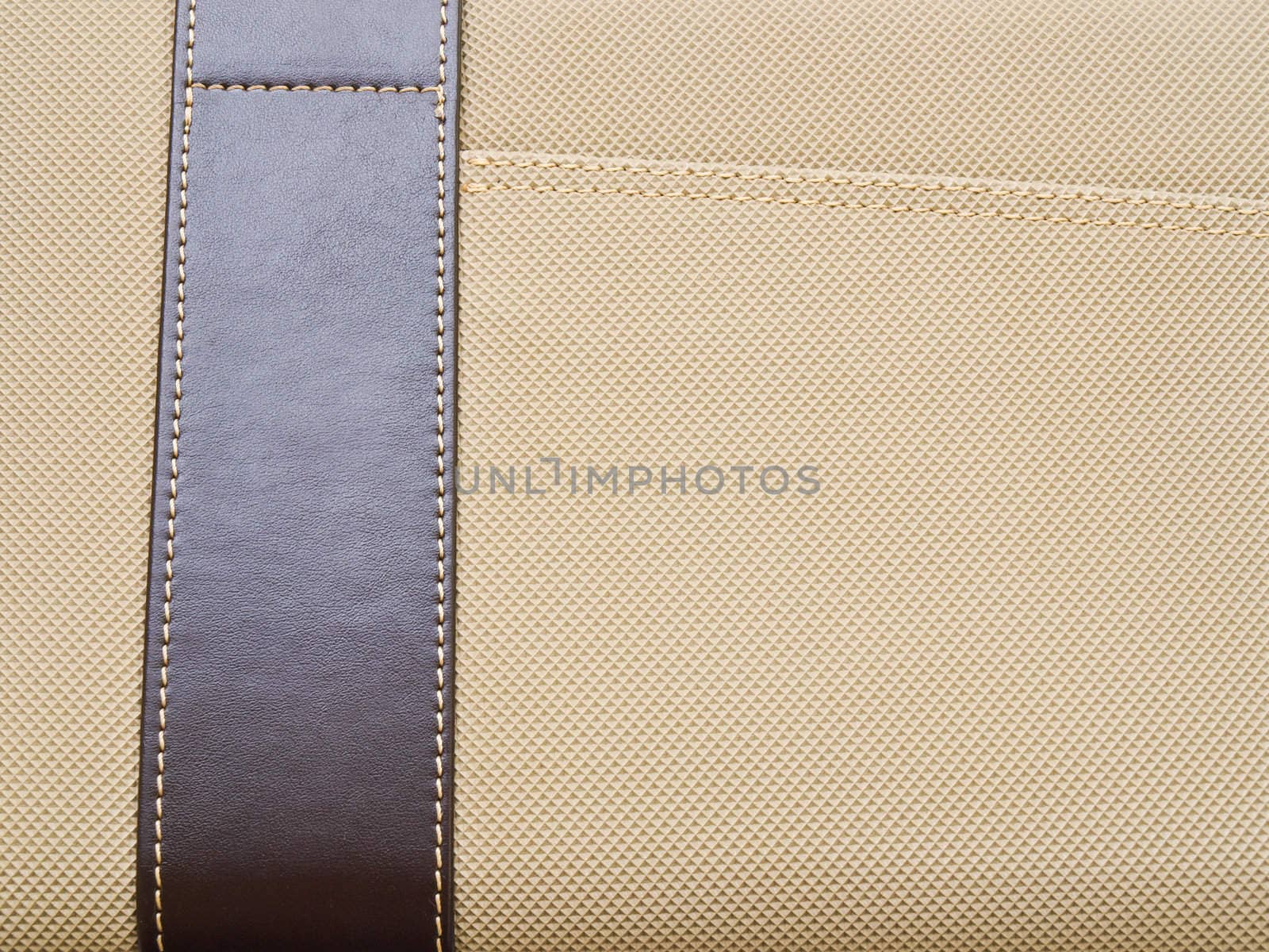 Artificial light brown leather texture background
