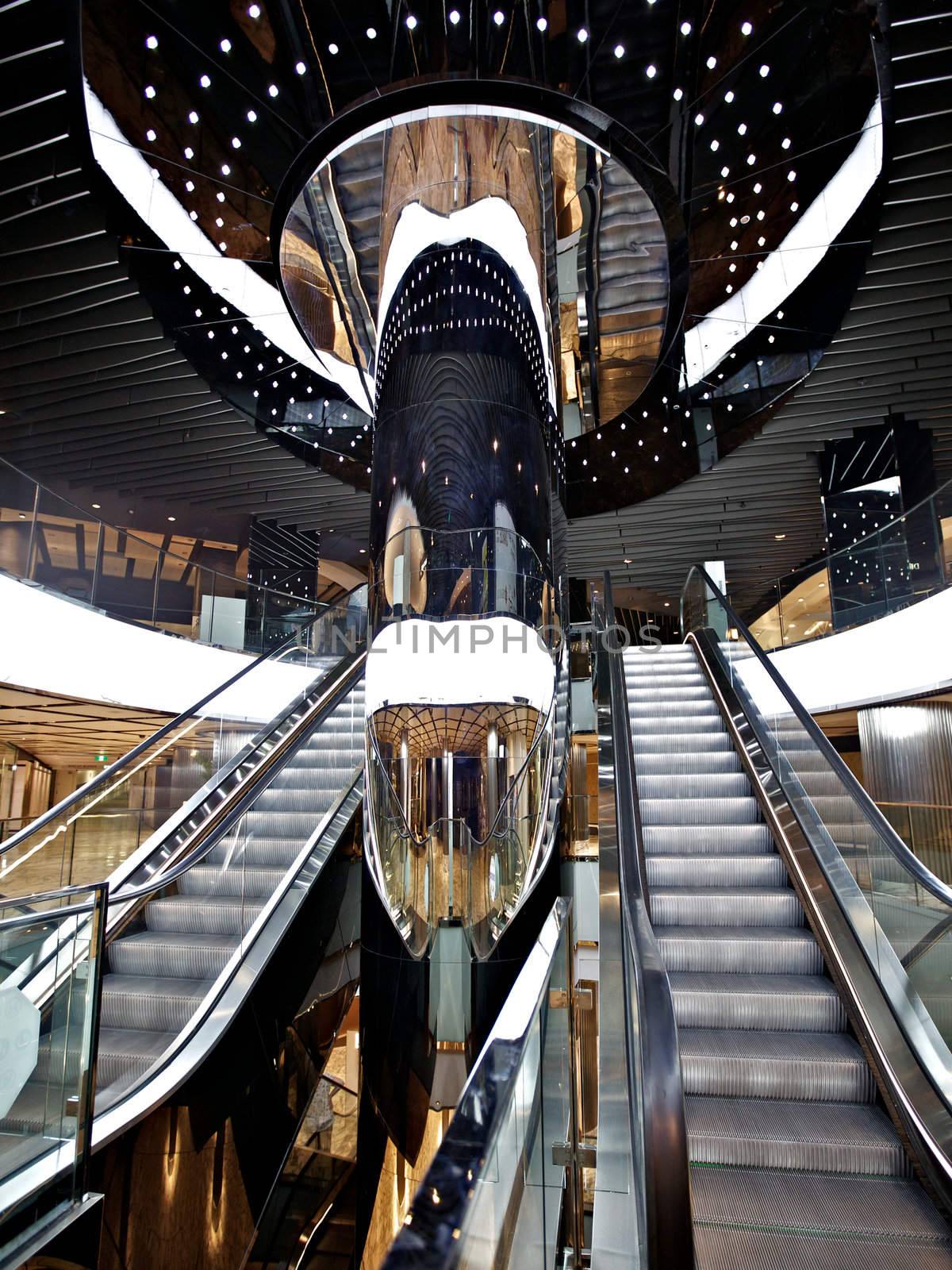 Inside a shopping mall with the escalator interior