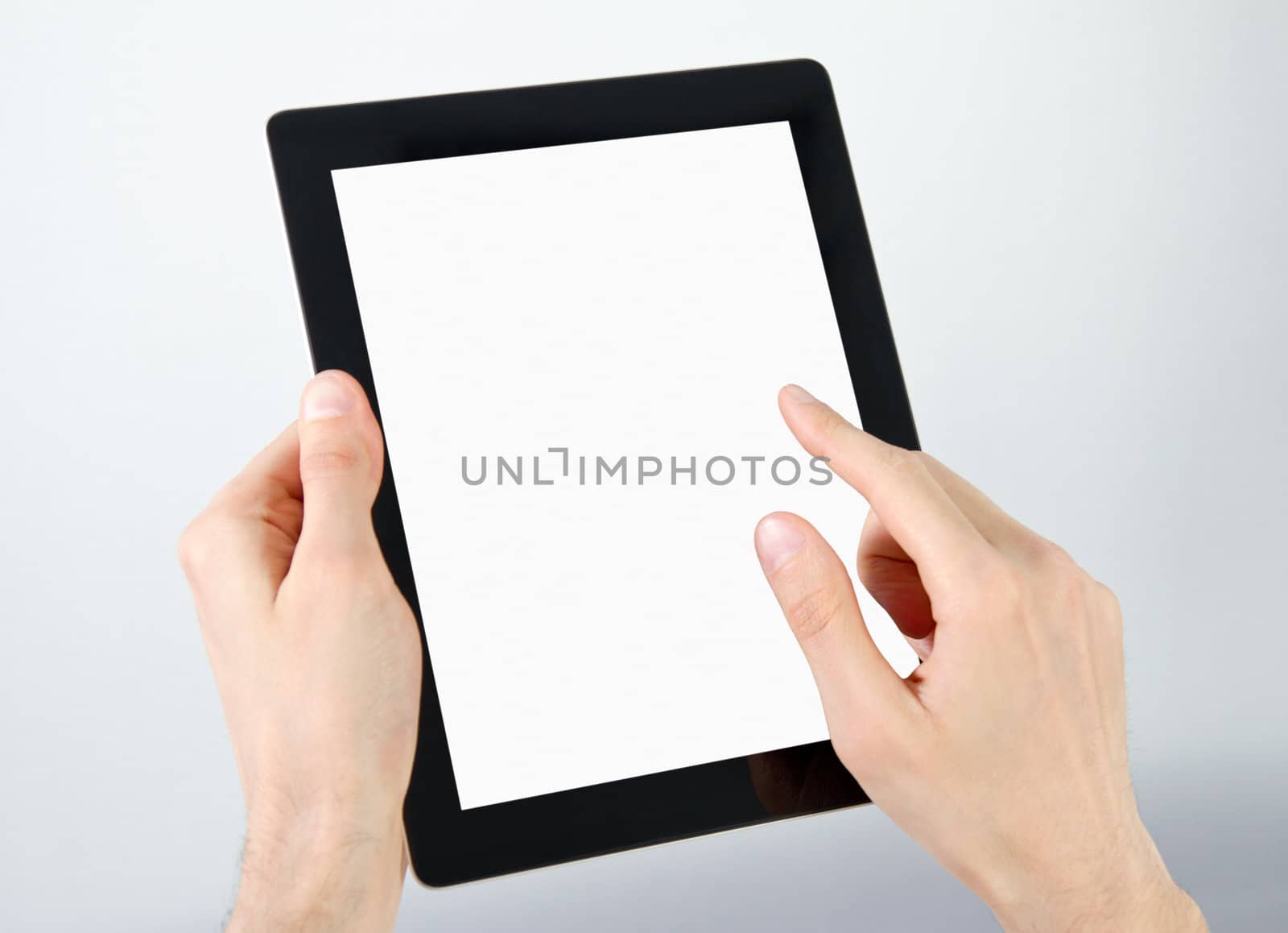 Holding And Point On Electronic Tablet PC by bloomua