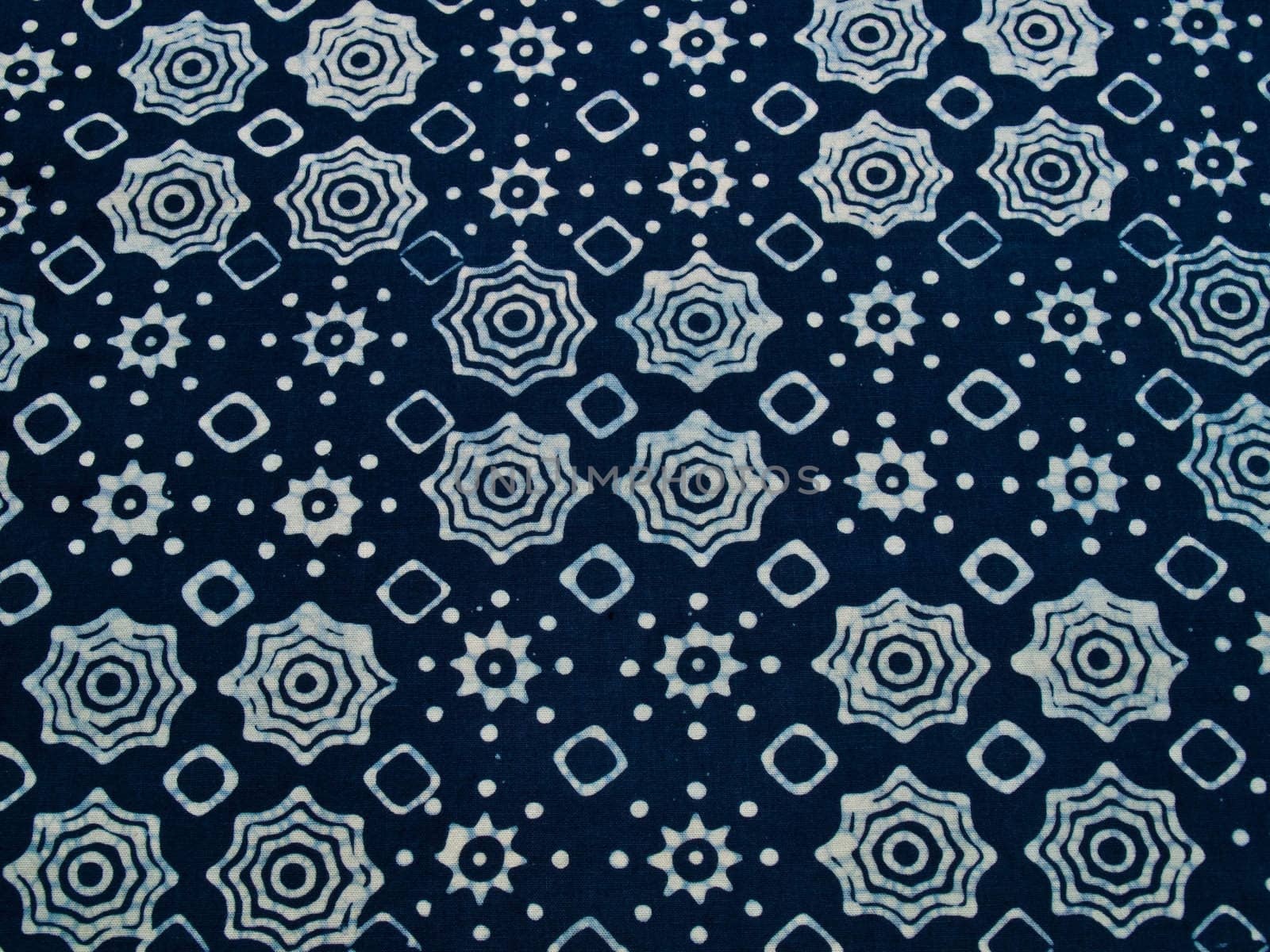Blue batik fabric with repettition pattern as background from Yo by gururugu