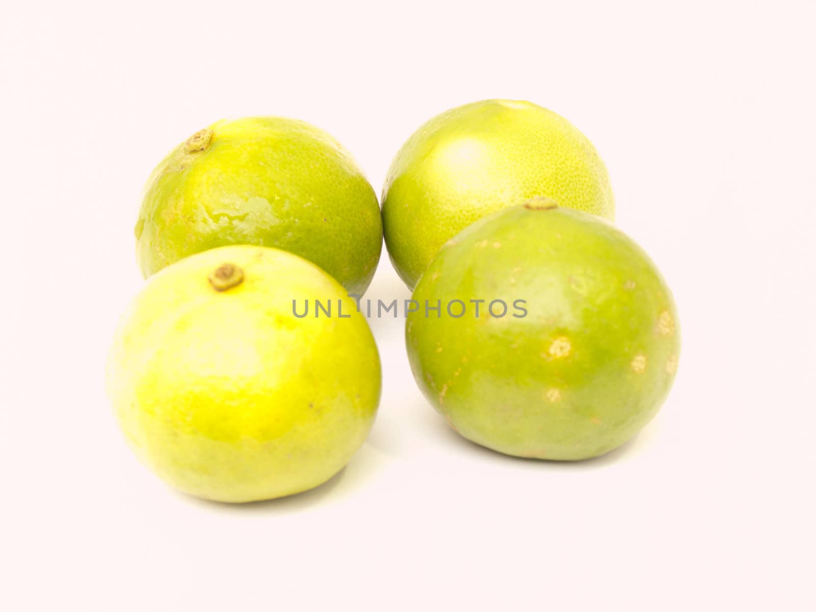 Limes isolated on white background