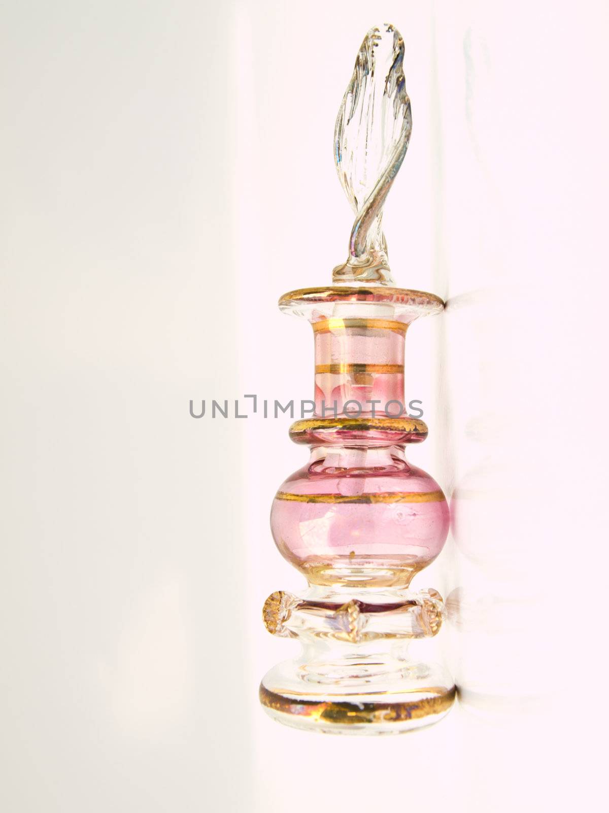 A miniature pink glass perfume bottle from Egypt by gururugu