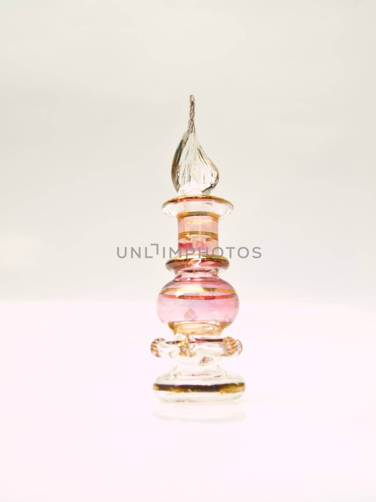 A miniature pink glass perfume bottle from Egypt