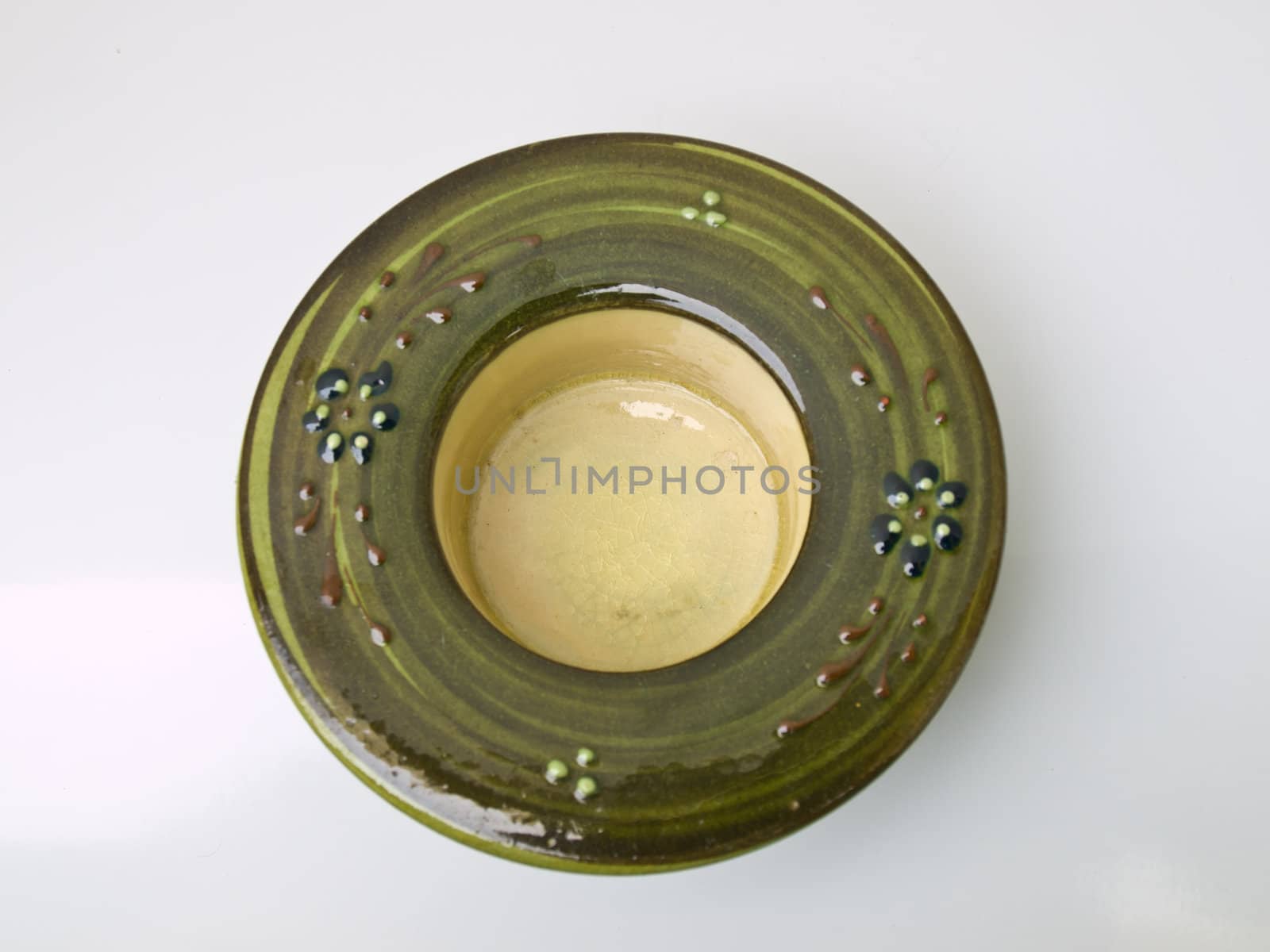 A green ceramic candle handle Handmade from Lampang, the North of Thailand