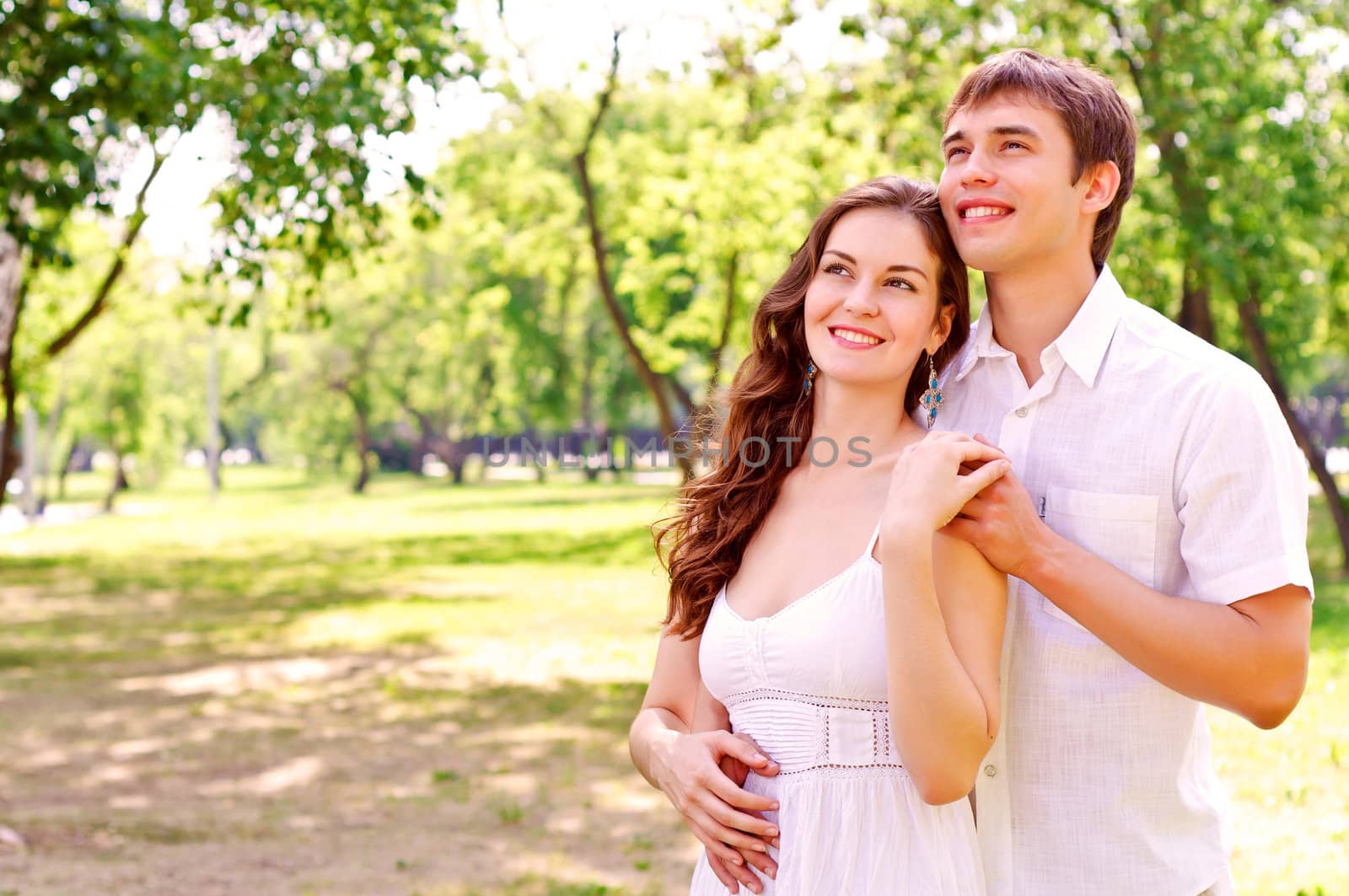 couple hugging in the park, have a good time together