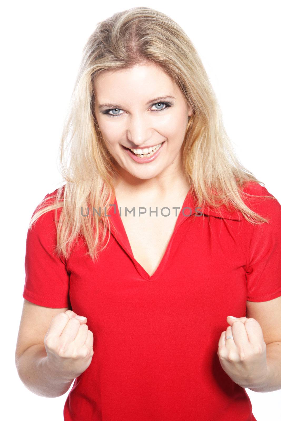 Happy Caucasian woman clenching both her fists