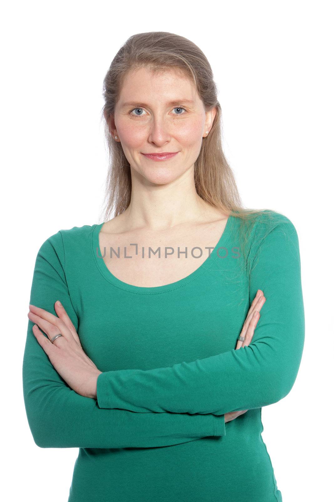 Casual mid aged woman with her arm crossed against the white background