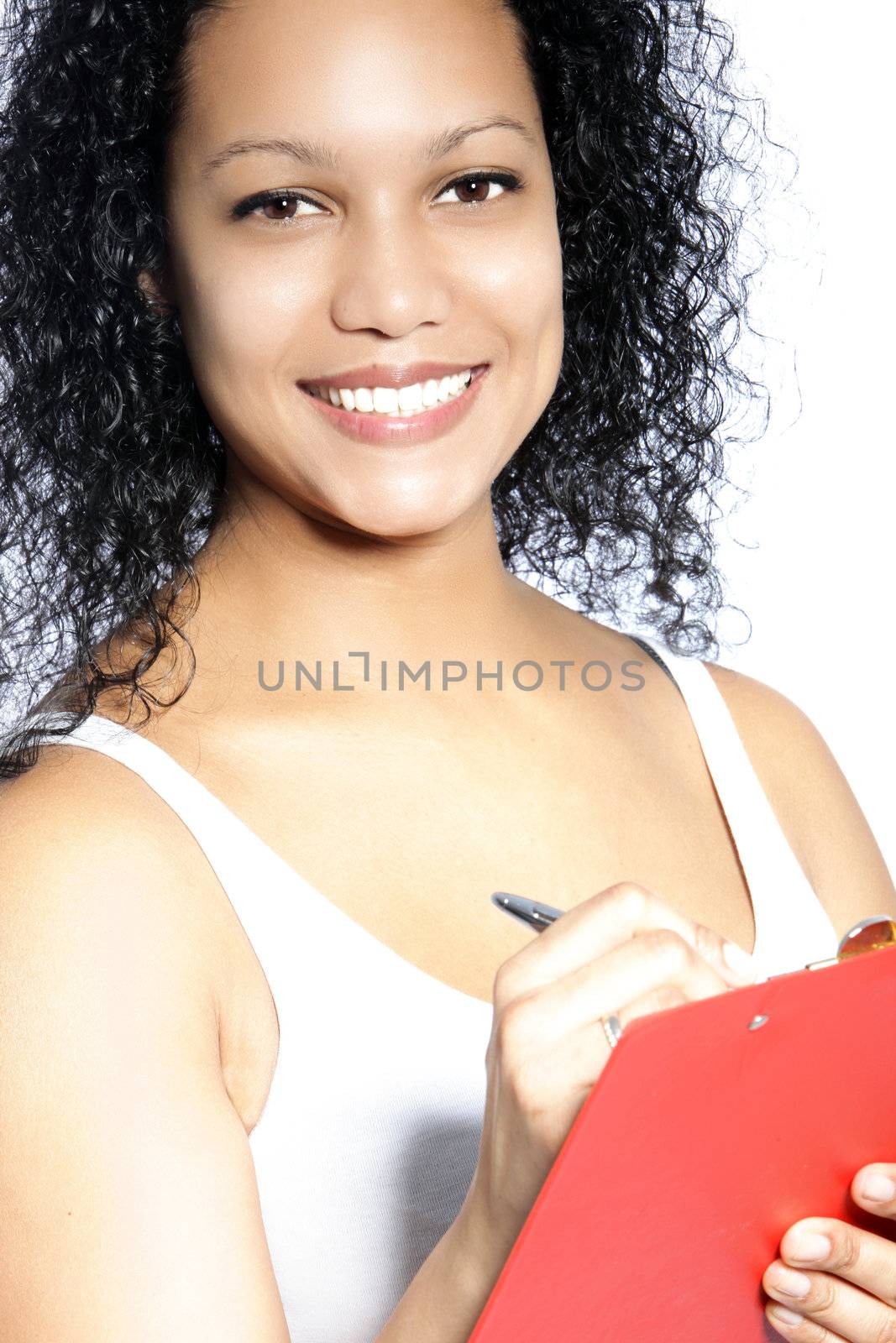 Smiling African American woman holding pen and red folder