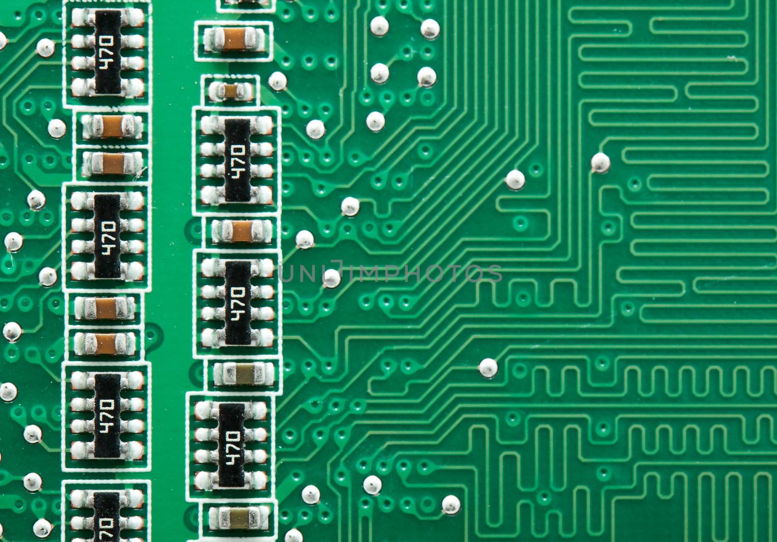 Green circuit board with components