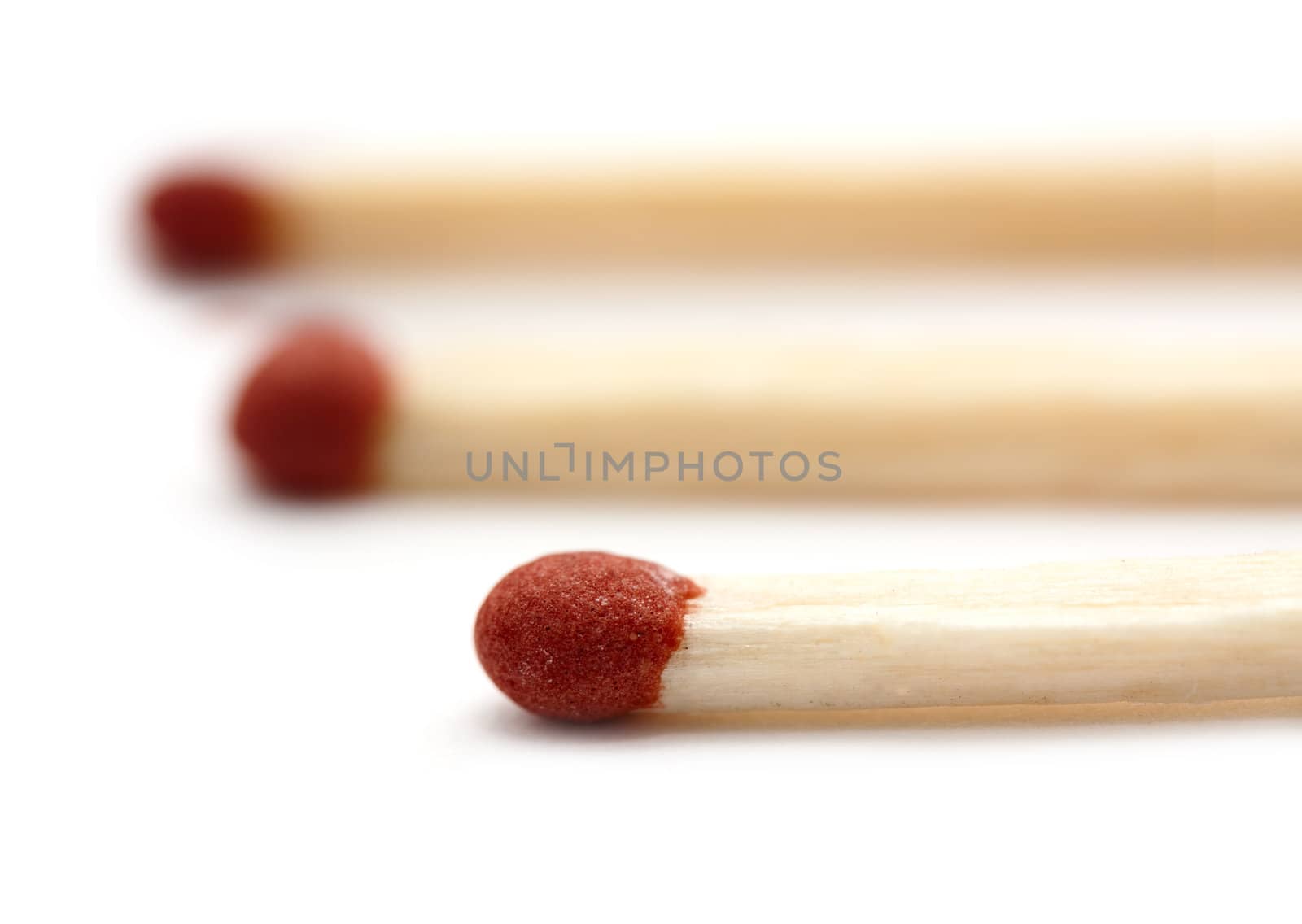 Three matches on white background