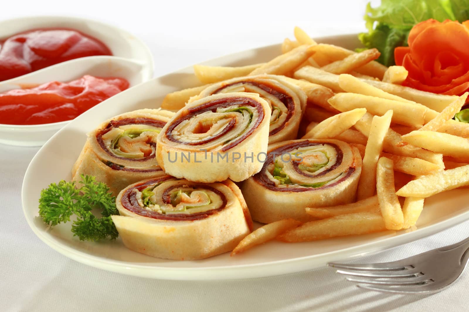 Spiral Sandwich Appetizers with french fries