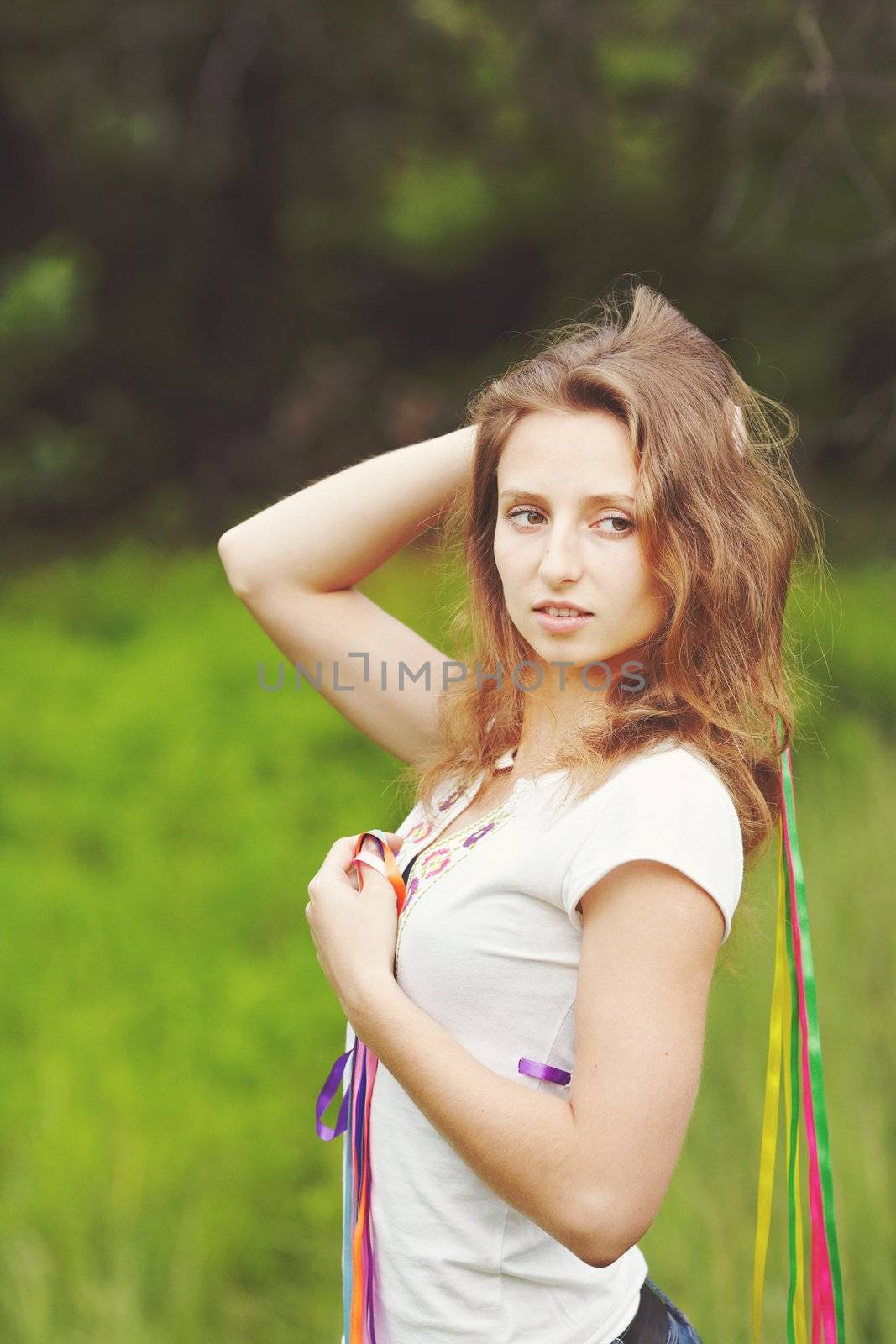 Beautiful girl with ribbons. Early morning photo