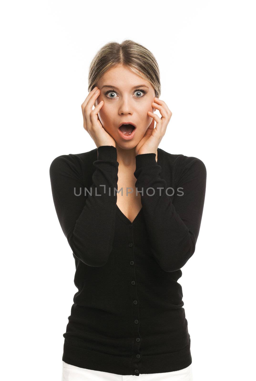 Young woman surprised looking very surprised, on white