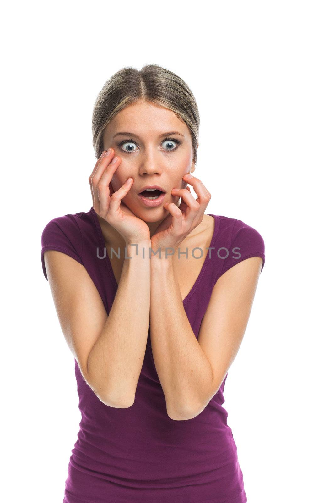 Young woman looking very surprised, on white