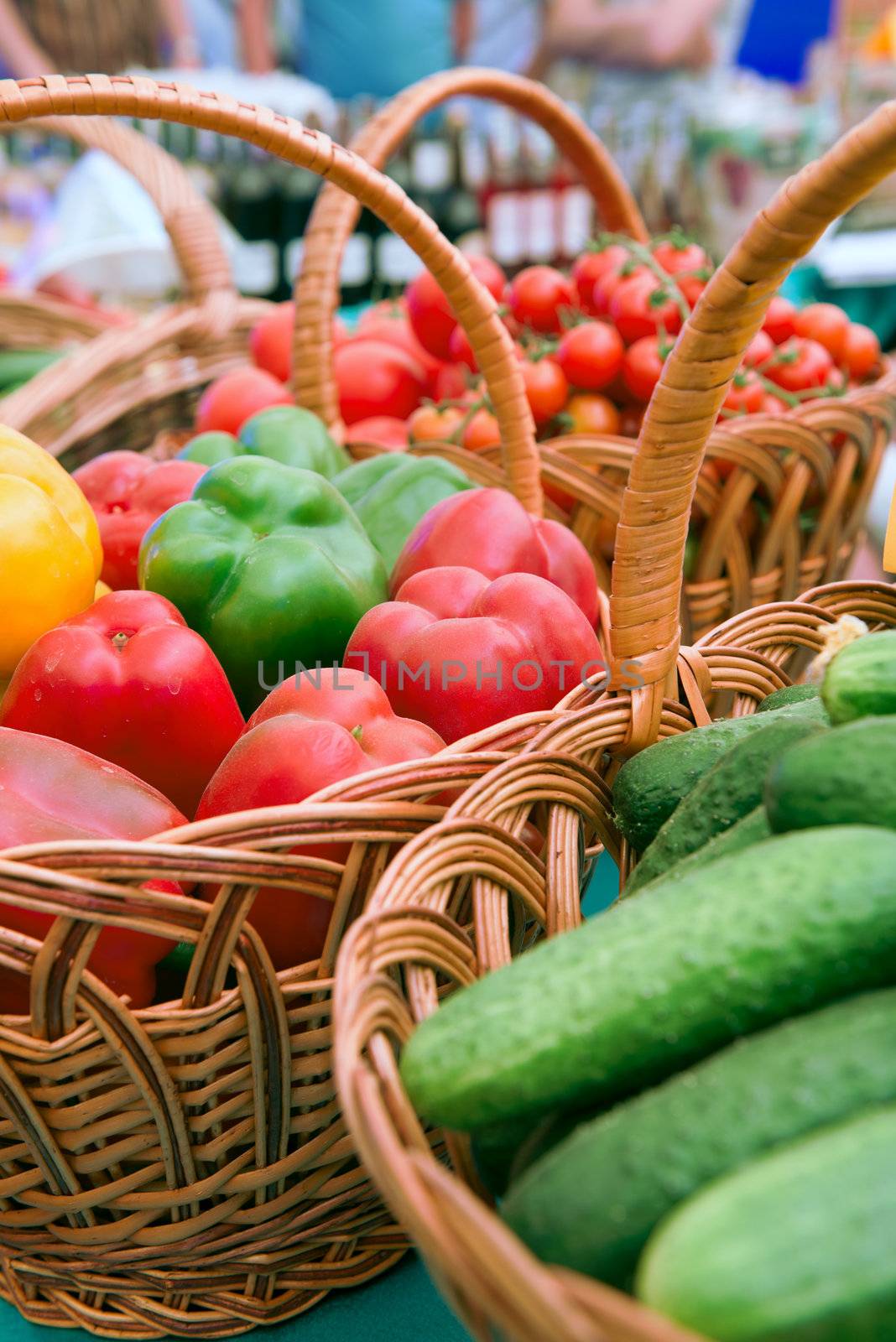 At the market. Basket with free vegetables .