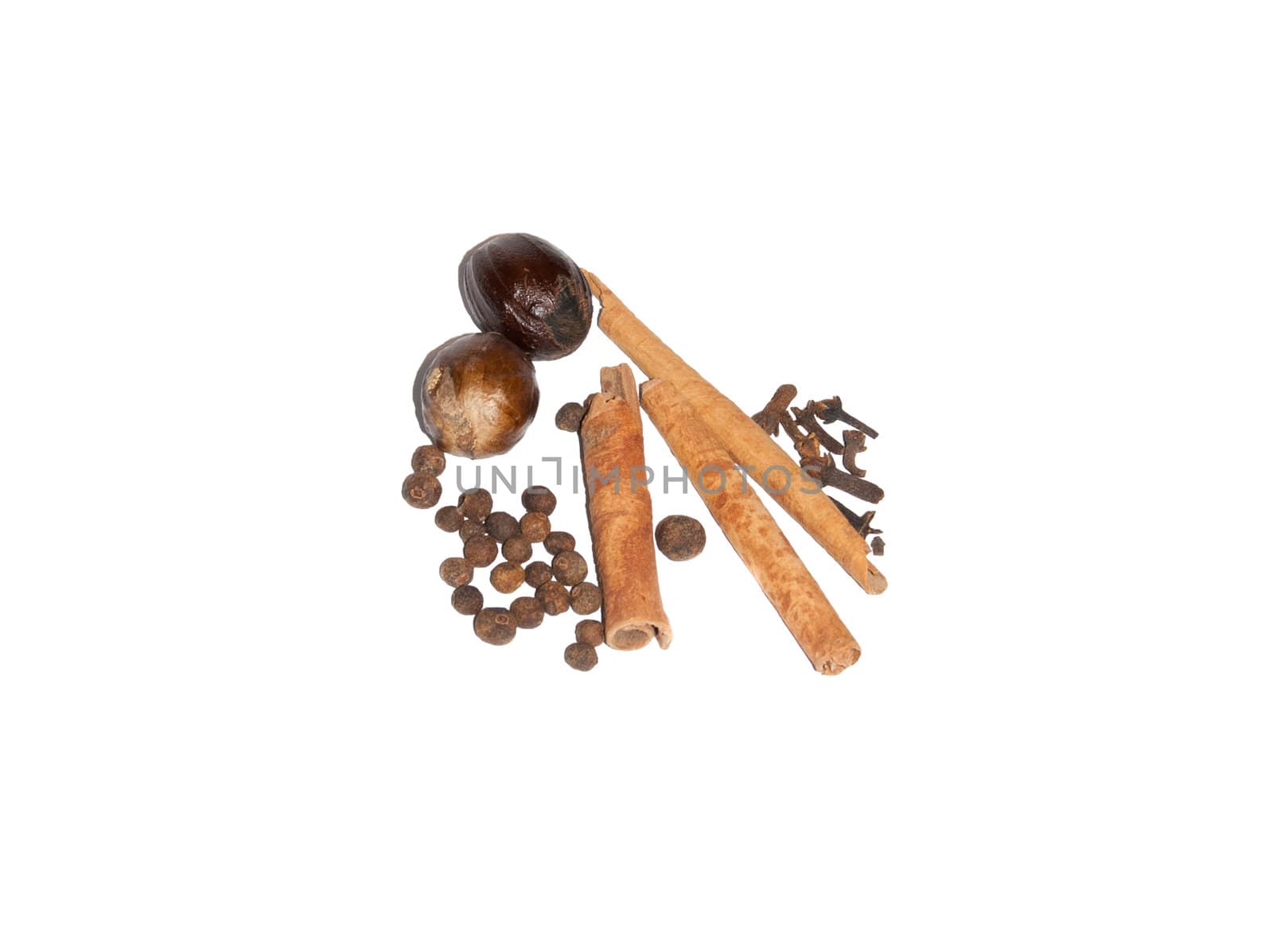 Composition of pepper, nutmeg, cinnamon, cloves isolated on white background