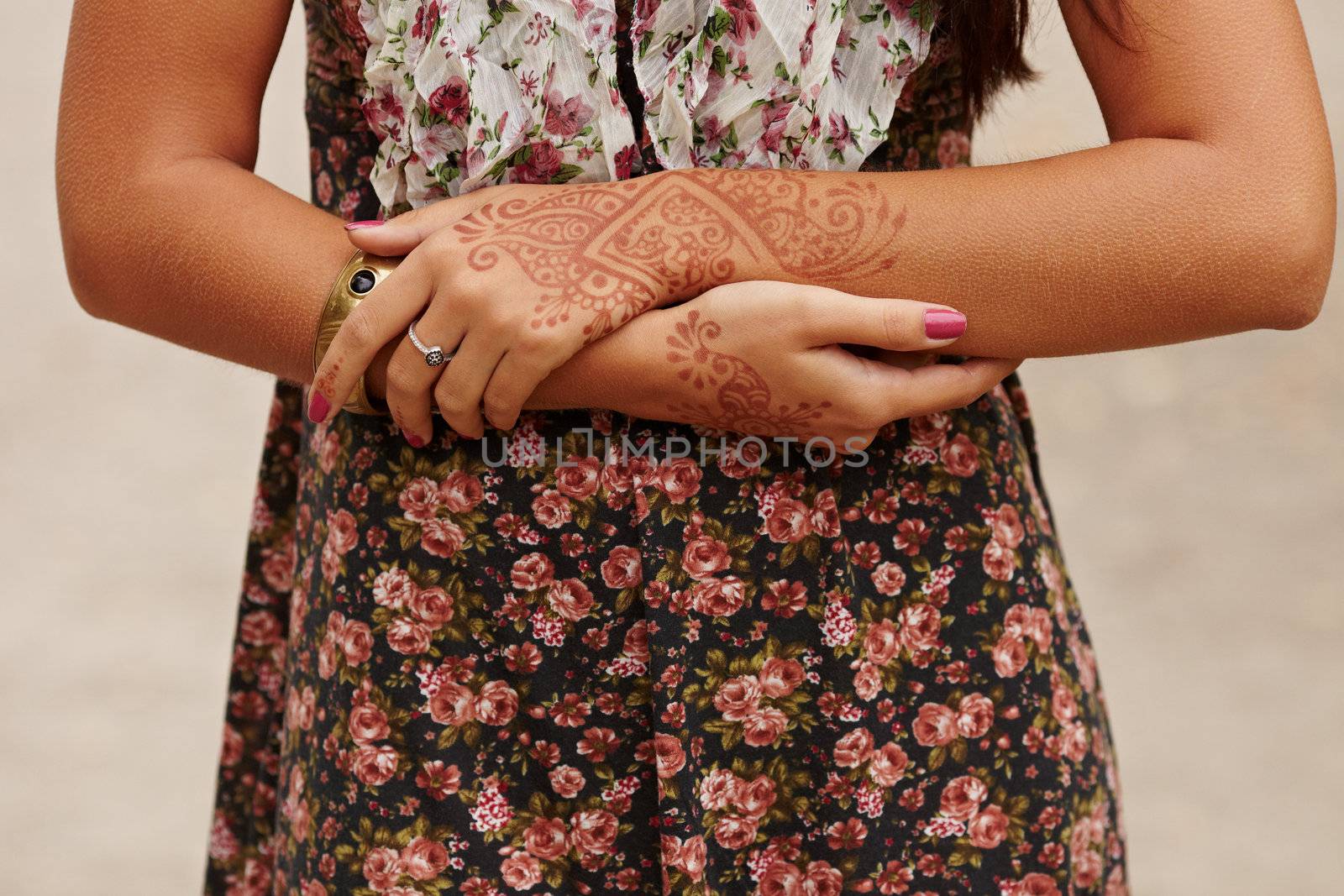 Girl with hands painted Mehandi. Picture by a henna