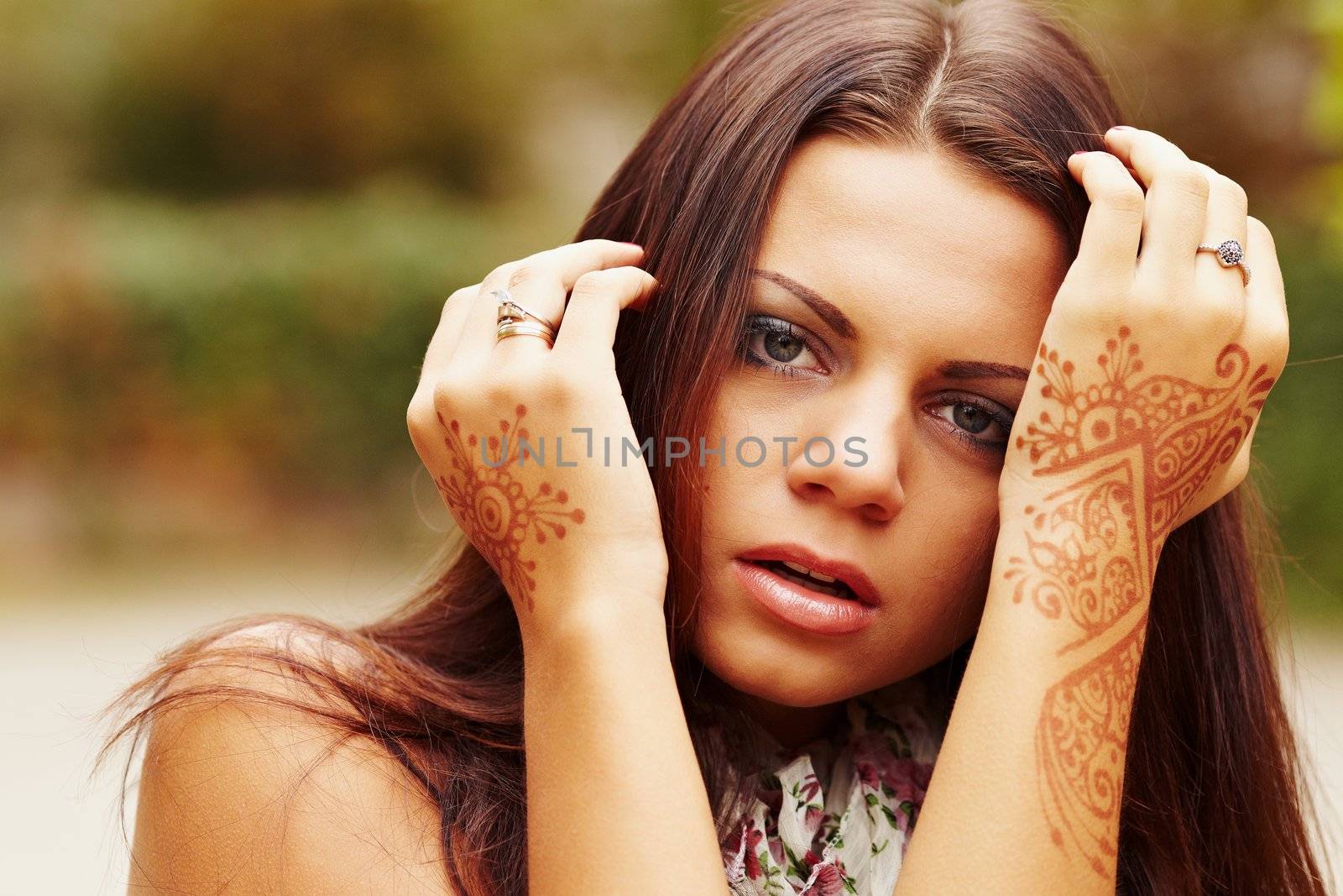 Girl with hands painted Mehandi. Picture by a henna