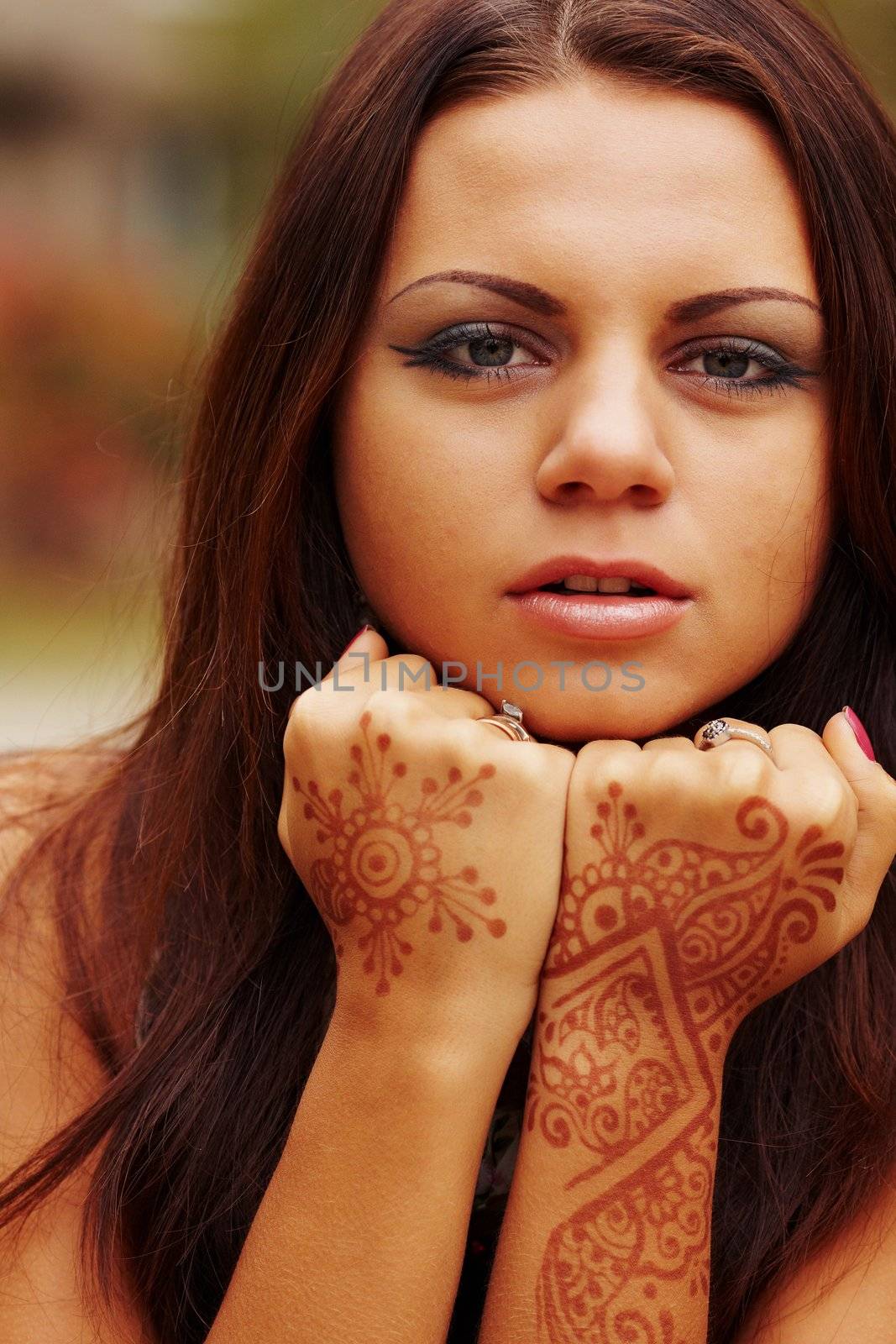 Girl with hands painted Mehandi. Picture by a henna